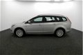 Ford Focus Wagon - 1.8 Titanium 125PK | 1e eigenaar | Voorruitverwarming | Parkeersensoren | Lm velg - 1 - Thumbnail