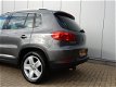 Volkswagen Tiguan - 2.0 TDI 140pk BMT 4Motion DSG Sport & Style - 1 - Thumbnail