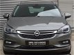 Opel Astra Sports Tourer - 1.4 Turbo Innovation Comfortstoelen | All-season | Navi - 1 - Thumbnail