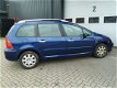 Peugeot 307 - SW 1.6-16V Pack Pano 7 Persoons - 1 - Thumbnail