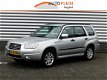 Subaru Forester - 2.0 X Premium Leer, Aut. Airco, LPG, Boekjes - 1 - Thumbnail