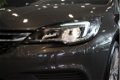 Opel Astra - 1.0 Edition *NIEUWJAARKNALLERS* | navi | led + xenon | cruise | bluetooth | - 1 - Thumbnail