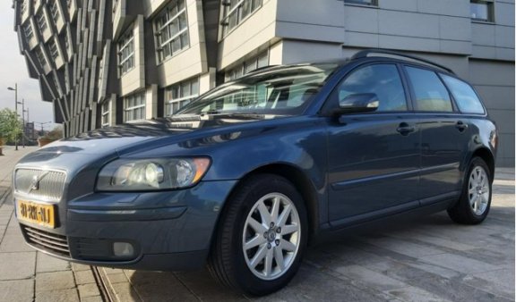 Volvo V50 - 2.0D Summum NAP / APK / NAVI / XENON / PDC / CLIMA / STOELVERW. / LEER / CRUISE - 1