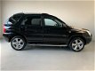 Kia Sportage - 2.7 V6 M-bition 4WD Automaat Leer Climate - 1 - Thumbnail