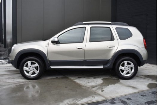 Dacia Duster - 1.6 Aniversare 4x4 | AIRCO | ALL-SEASON BANDEN | TREKHAAK | LEDER | LMV | PDC - 1