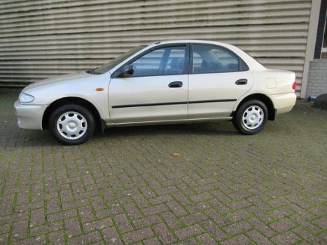 Mazda 323 - SEDAN 1.5I LX AUTOMAAT - 1