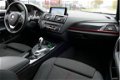 BMW 1-serie - 116d Executive AUTOMAAT / GROOT.NAVI / XENON / LED / CLIMA / CRUISE / SPORTSTOELEN / 5 - 1 - Thumbnail