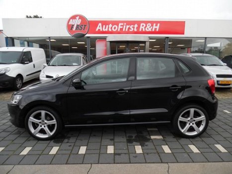 Volkswagen Polo - 1.2 TSI Comfortline 5 deurs , airco, sportvelgen , 6 versnellingen en navigatie - 1