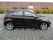 Volkswagen Polo - 1.2 TSI Comfortline 5 deurs , airco, sportvelgen , 6 versnellingen en navigatie - 1 - Thumbnail