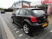 Volkswagen Polo - 1.2 TSI Comfortline 5 deurs , airco, sportvelgen , 6 versnellingen en navigatie - 1 - Thumbnail