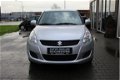 Suzuki Swift - 1.2 Comfort EASSS Airco Start/stop - 1 - Thumbnail