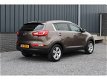 Kia Sportage - 2.0i 163pk X-ecutive Plus NAVIGATIE + PANORAMA - 1 - Thumbnail