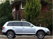 Volkswagen Touareg - 4.2 V8 318PK 4-motion / leder + trekhaak - 1 - Thumbnail