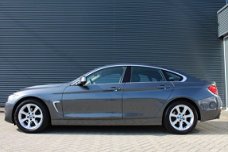 BMW 4-serie Gran Coupé - 420i 184pk Executive Leer Navigatie Xenon
