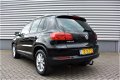 Volkswagen Tiguan - 1.4 TSI Sport & Style 160pk - 1 - Thumbnail