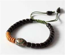Tibetaanse armband met Dzi kraal en natuurlijke materialen