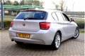 BMW 1-serie - 116i Business+ 5-Deurs Xenon/Navi/LMV - 1 - Thumbnail