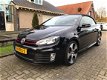 Volkswagen Golf Cabriolet - 2.0 TSI GTI Navi Leer - 1 - Thumbnail