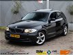 BMW 1-serie - 118i Business Line schuif/kanteldak- Apk nieuw- nette auto - 1 - Thumbnail