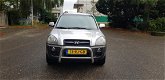 Hyundai Tucson - 2.0i CVVT DynamicVersion 2WD - 1 - Thumbnail