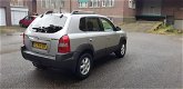 Hyundai Tucson - 2.0i CVVT DynamicVersion 2WD - 1 - Thumbnail