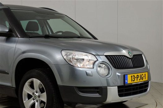 Skoda Yeti - 1.2 TSI Ambition Navigatie/Trekhaak / Pdc / Clima /Cruise /Regensensor - 1