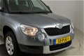 Skoda Yeti - 1.2 TSI Ambition Navigatie/Trekhaak / Pdc / Clima /Cruise /Regensensor - 1 - Thumbnail