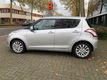 Suzuki Swift - 1.2 Exclusive EASSS Top staat - 1 - Thumbnail