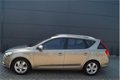 Kia Cee'd - 1.4 CVVT Seven | Navigatie | Cruise Control | Airconditioning - 1 - Thumbnail