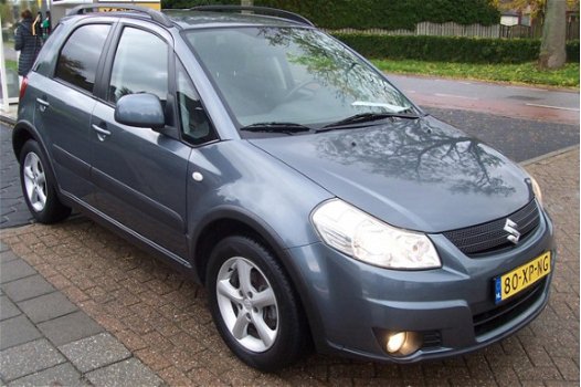 Suzuki SX4 - 1.6 Shogun 5 Drs.Supernette auto. Airco.Hoge zit.LM Velgen. Lage km stand.Apk tot 10-08 - 1