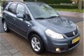 Suzuki SX4 - 1.6 Shogun 5 Drs.Supernette auto. Airco.Hoge zit.LM Velgen. Lage km stand.Apk tot 10-08 - 1 - Thumbnail