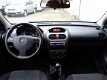 Opel Corsa - 1.2-16V 5-Deurs Zuinig Elek-Pakket LM-velgen Cosmo - 1 - Thumbnail