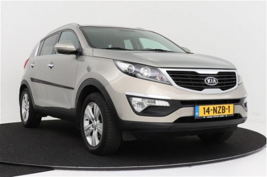 Kia Sportage - 2.0 X-ecutive Plus Pack | Parkeersensoren | Climate control | Trekhaak - 1