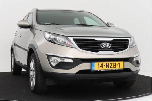 Kia Sportage - 2.0 X-ecutive Plus Pack | Parkeersensoren | Climate control | Trekhaak - 1