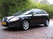 Seat Leon - 1.6 Stylance 1e Eigenaar / Navi / Clima / Cruise Contr. / CV Met AB / El. Rmn - 1 - Thumbnail