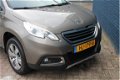 Peugeot 2008 - 1.2 PureTech 110pk Style | Navigatie | Lichtmetaal | Trekhaak | 1e Eigenaar | - 1 - Thumbnail