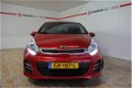 Kia Rio - 1.2 CVVT DynamicLine, NAVI, CAM, AIRCO, CRUISE C, ELEK RAMEN - 1 - Thumbnail