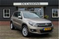 Volkswagen Tiguan - 1.4 TSI Sport&Style Navigatie, cruise control, clima, 17 inch, stoelverwarming - 1 - Thumbnail