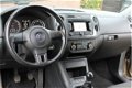 Volkswagen Tiguan - 1.4 TSI Sport&Style Navigatie, cruise control, clima, 17 inch, stoelverwarming - 1 - Thumbnail