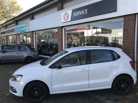 Volkswagen Polo - 1.2 TSI Comfortline Navigatie, cruise control, lichtmetalen velgen, armsteun. inru - 1