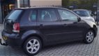 Volkswagen Polo - 1.4-16V Optive 5 Deurs Zwart - 1 - Thumbnail