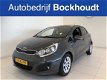 Kia Rio - 1.2 CVVT Plus Pack Navigatie | Airco | 1.000, - Slooppremie - 1 - Thumbnail