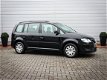 Volkswagen Touran - 1.6 Optive | Airco | Cruise | Trekhaak | All weather banden | 129000 kilometer a - 1 - Thumbnail