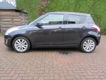 Suzuki Swift - 1.2 Exclusive EASSS / stoelverwarming / climate control / cruise control - 1 - Thumbnail