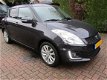 Suzuki Swift - 1.2 Exclusive EASSS / stoelverwarming / climate control / cruise control - 1 - Thumbnail