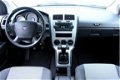 Dodge Caliber - 1.8 SXT 96.000km incl NAP 1eEIGNR SUBWOOFER AIRCO CRUISE '07 - 1 - Thumbnail