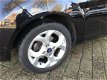 Ford Fiesta - 1.25 Titanium 5 deurs , lichtmetalen vegen, mistlampen, airco, chrome raam lijsten inr - 1 - Thumbnail