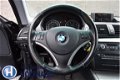 BMW 1-serie - 116i Business Line Climate control/Navigatie/Elektrische ramen/16'' LM velgen - 1 - Thumbnail
