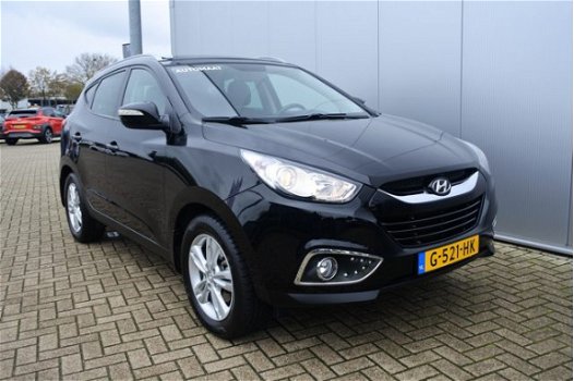 Hyundai ix35 - 2.0i Business Edition | WEEKAANBIEDING | Rijklaar met 2 jaar Garantie | Navigatie | C - 1