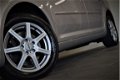 Volkswagen Touran - 1.4 TSI 140PK Comfortline 7p. NAVI/PRIVACYGLAS/PDC/CLIMA - 1 - Thumbnail